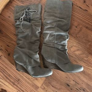 Naughty Monkey 🐒 sued slouch boots.